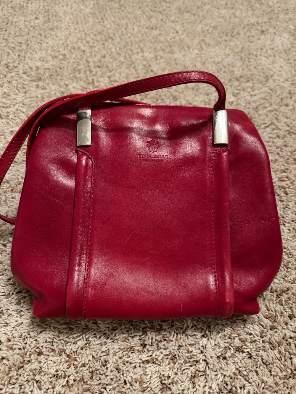 Vintage red genuine leather backpack, handbag, wallet and organizer.